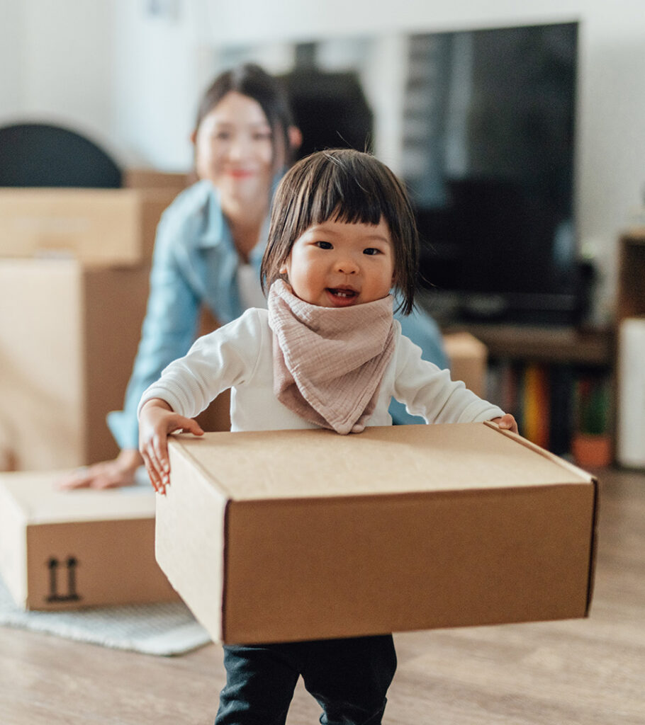 child holding box